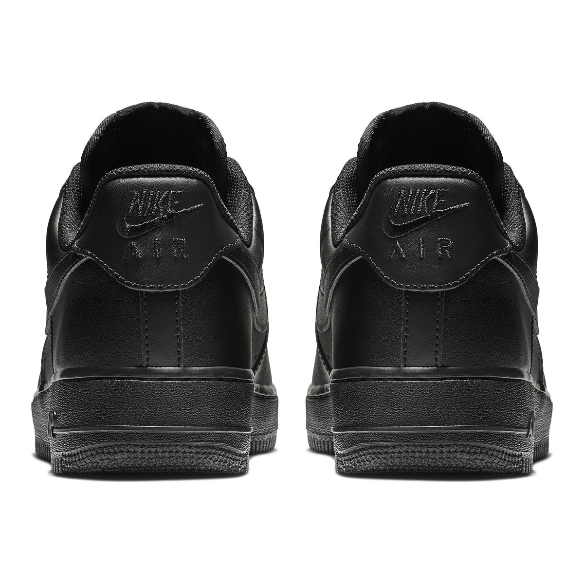 Black heel view of low-top sneakers with cushioned collar and stitched seams