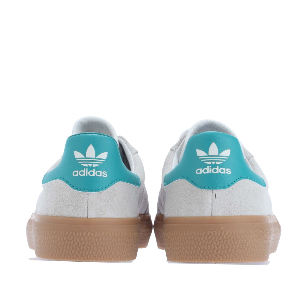 Pair of white adidas 3MC trainers with teal heel panels and gum rubber soles