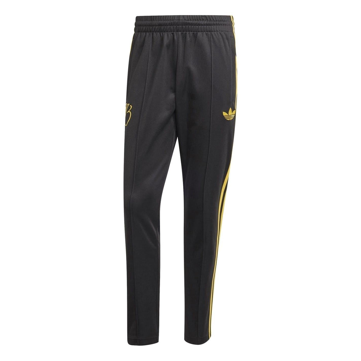 Black slim track pants with elastic waist, three yellow side stripes, and logo accents