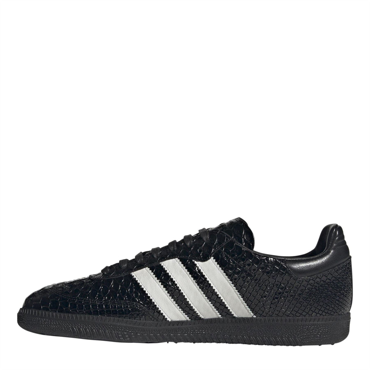 Black low-top sneakers with white triple stripes and lace-up front