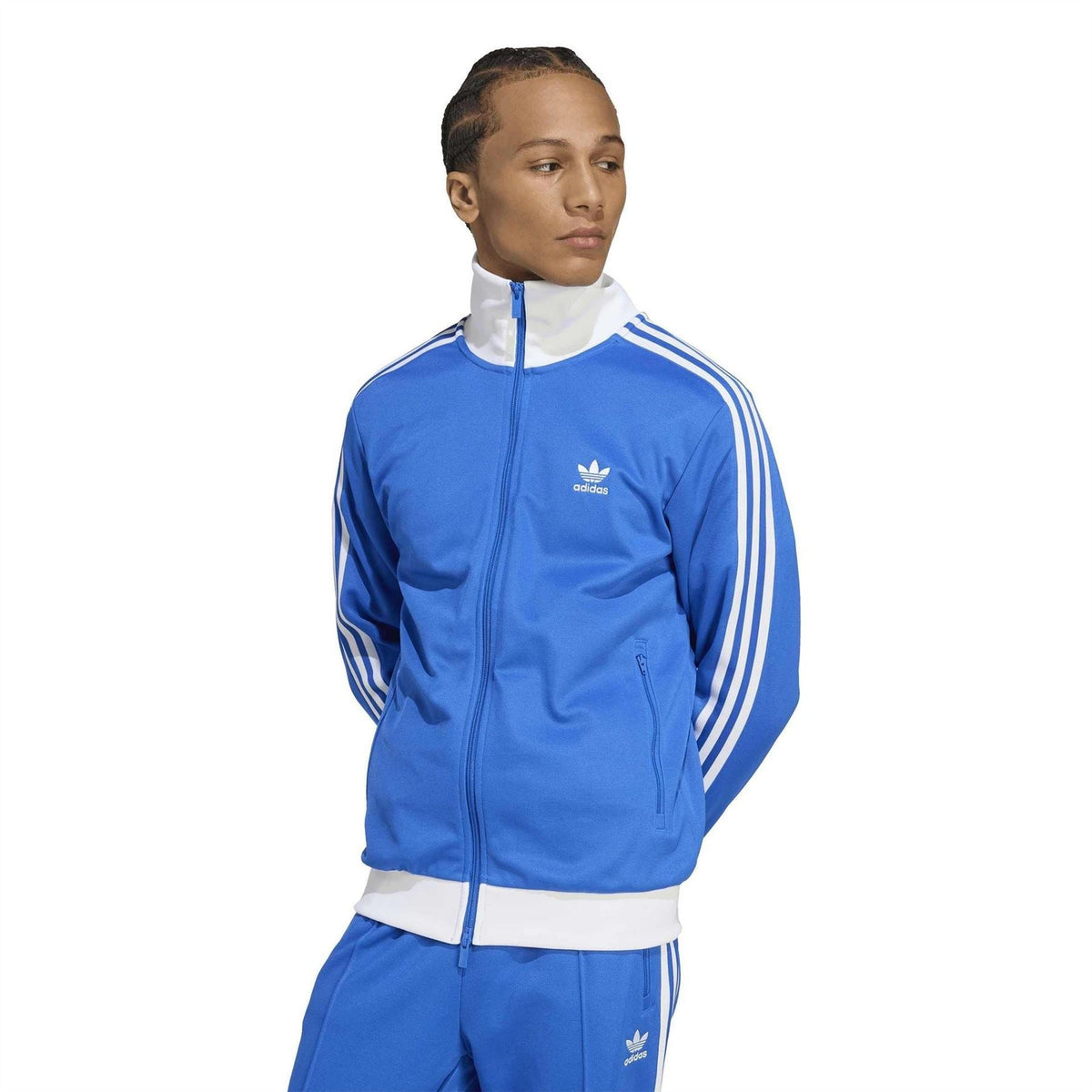 adidas Originals Adicolor Classics Track Top in vibrant color, featuring a sporty design with zip-up front and ribbed cuffs.
