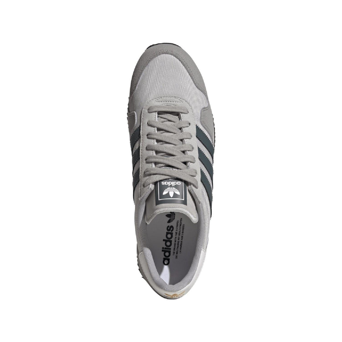 Light grey adidas USA 84 trainers, lace-up front with tongue label inside view