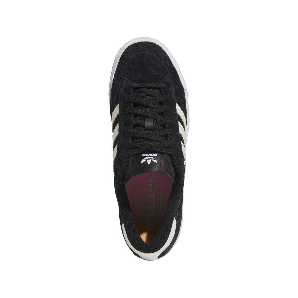 Black lace-up trainers with white trim and NORA branding on the tongue
