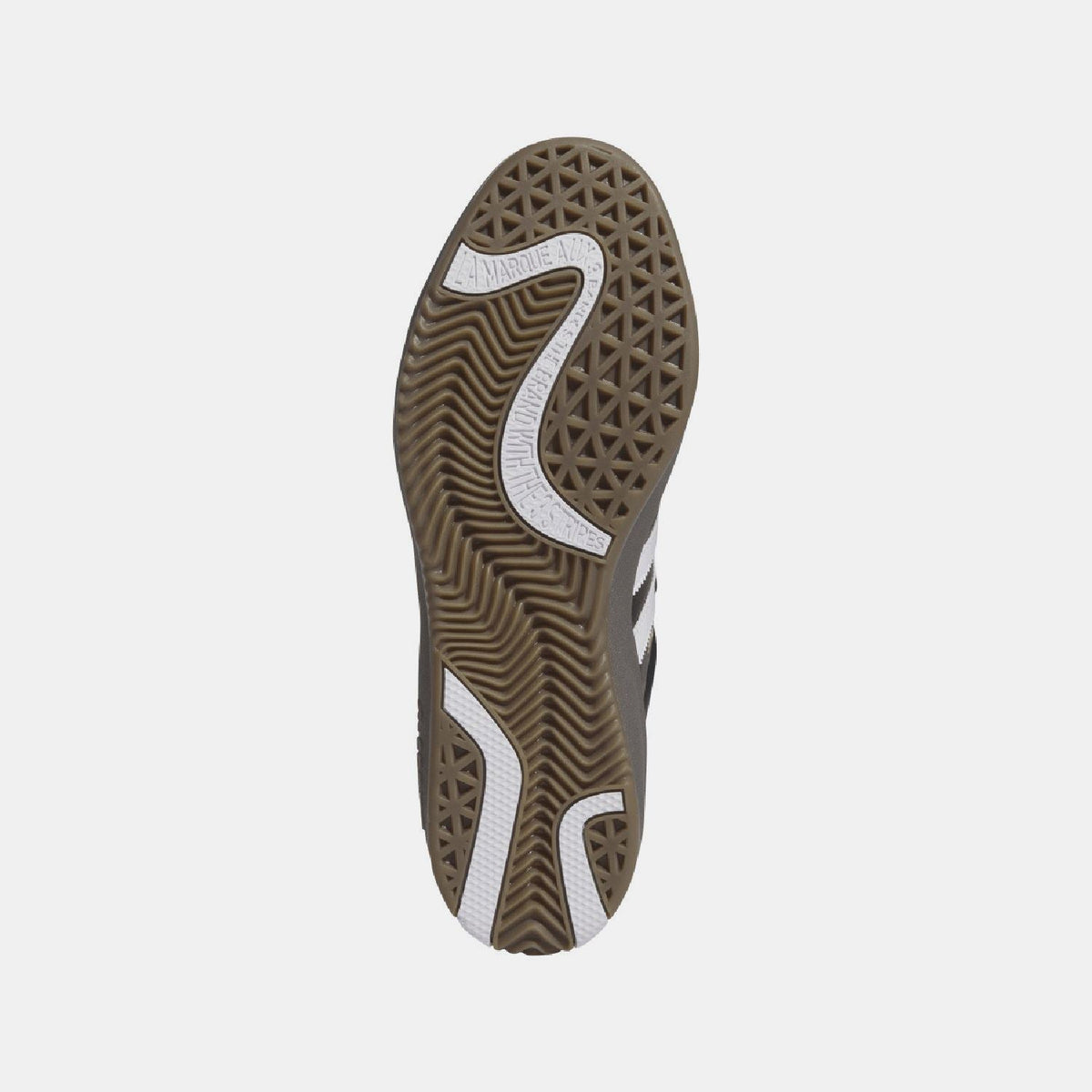 Shoe outsole with tan tread and white-and-black sidewall pattern
