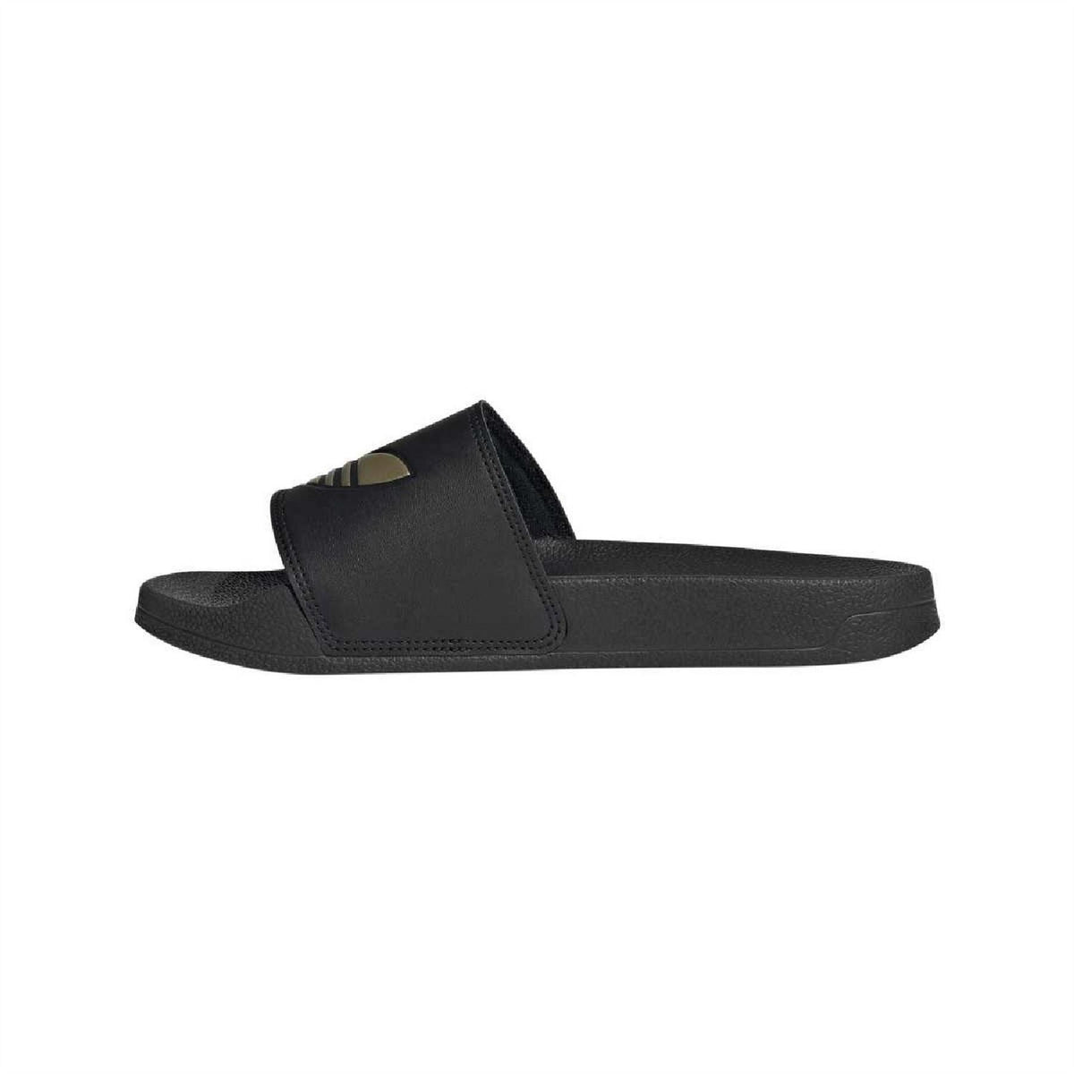 Black slide sandals with wide strap and gold logo patch on vamp