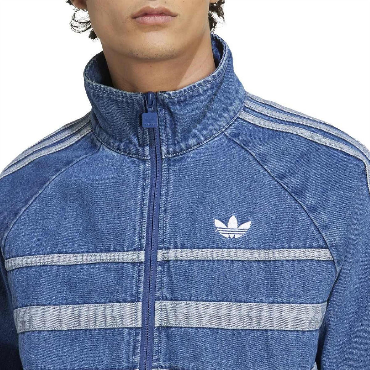 adidas Originals Adicolor high neck raglan sleeve athletic top, close-up of navy tracksuit top with contrasting white sleeves
