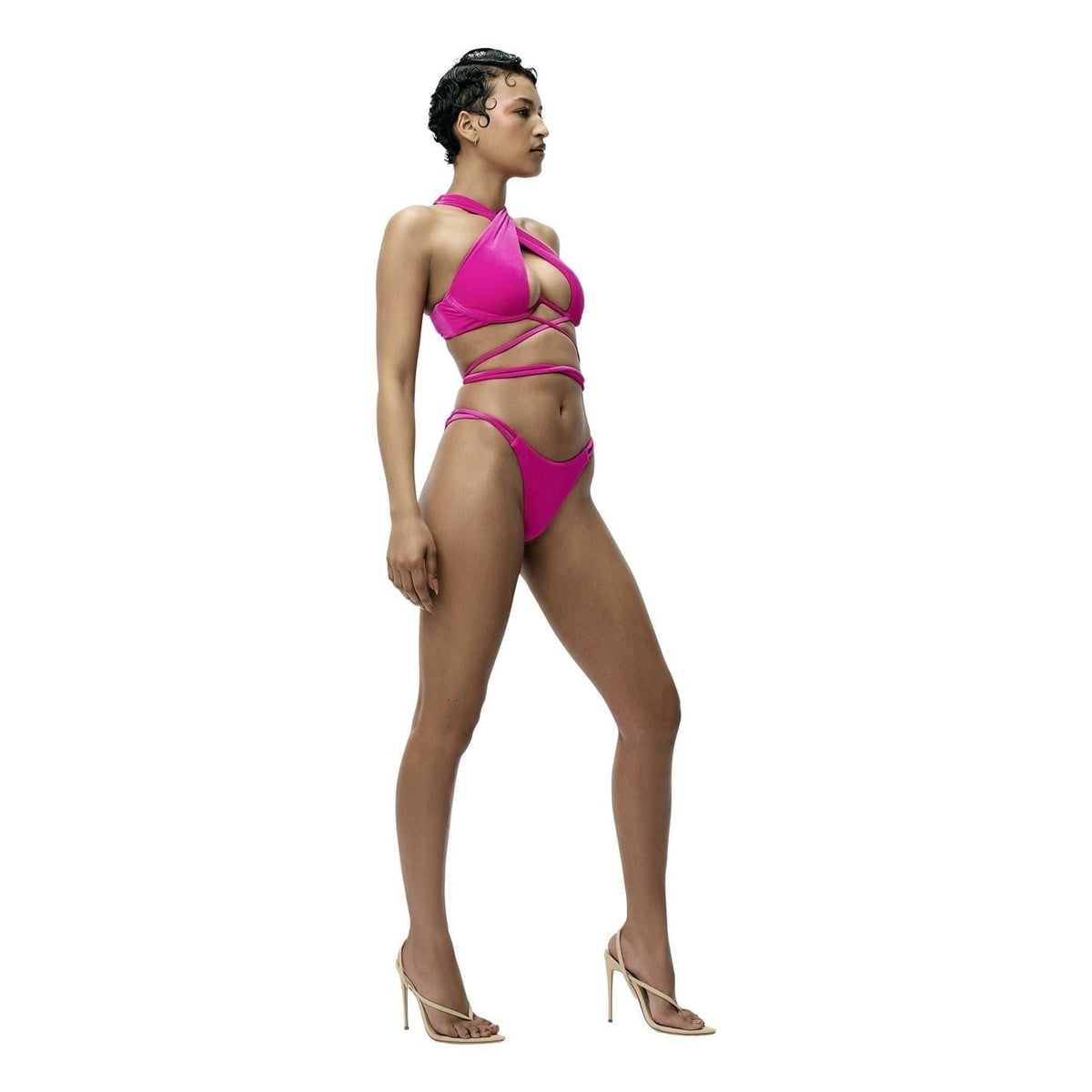 adidas Originals Ivy Park lace-up bikini top in swimwear with adjustable straps and vibrant color, close-up view of the swimsuit.