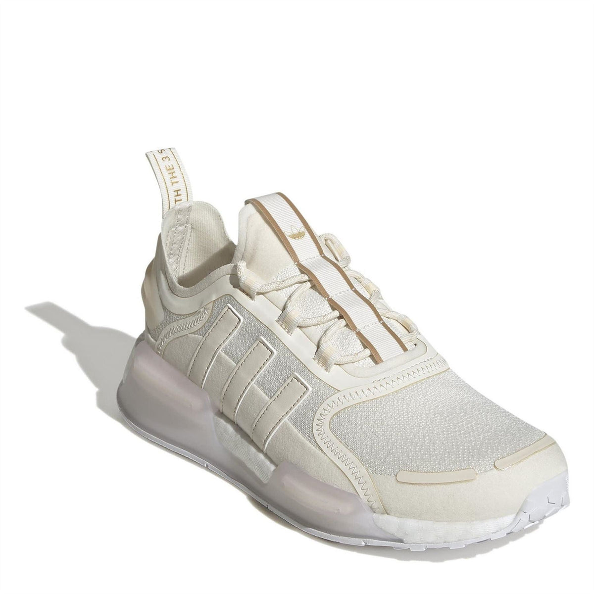 adidas Originals low-top trainers with light white textured upper, lace-up closure and padded collar