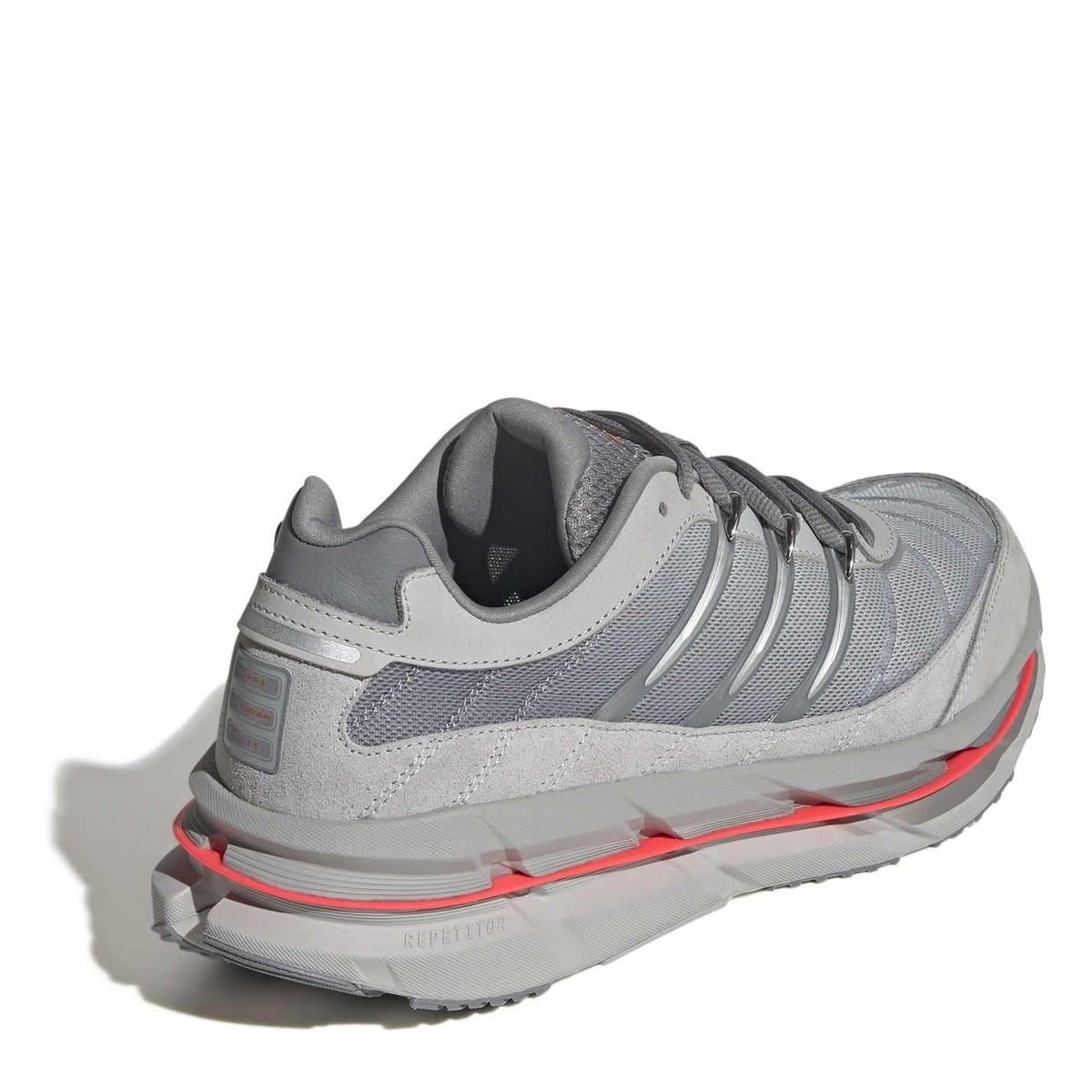 Dark grey lace-up sneakers with cushioned collar and red-accented heel