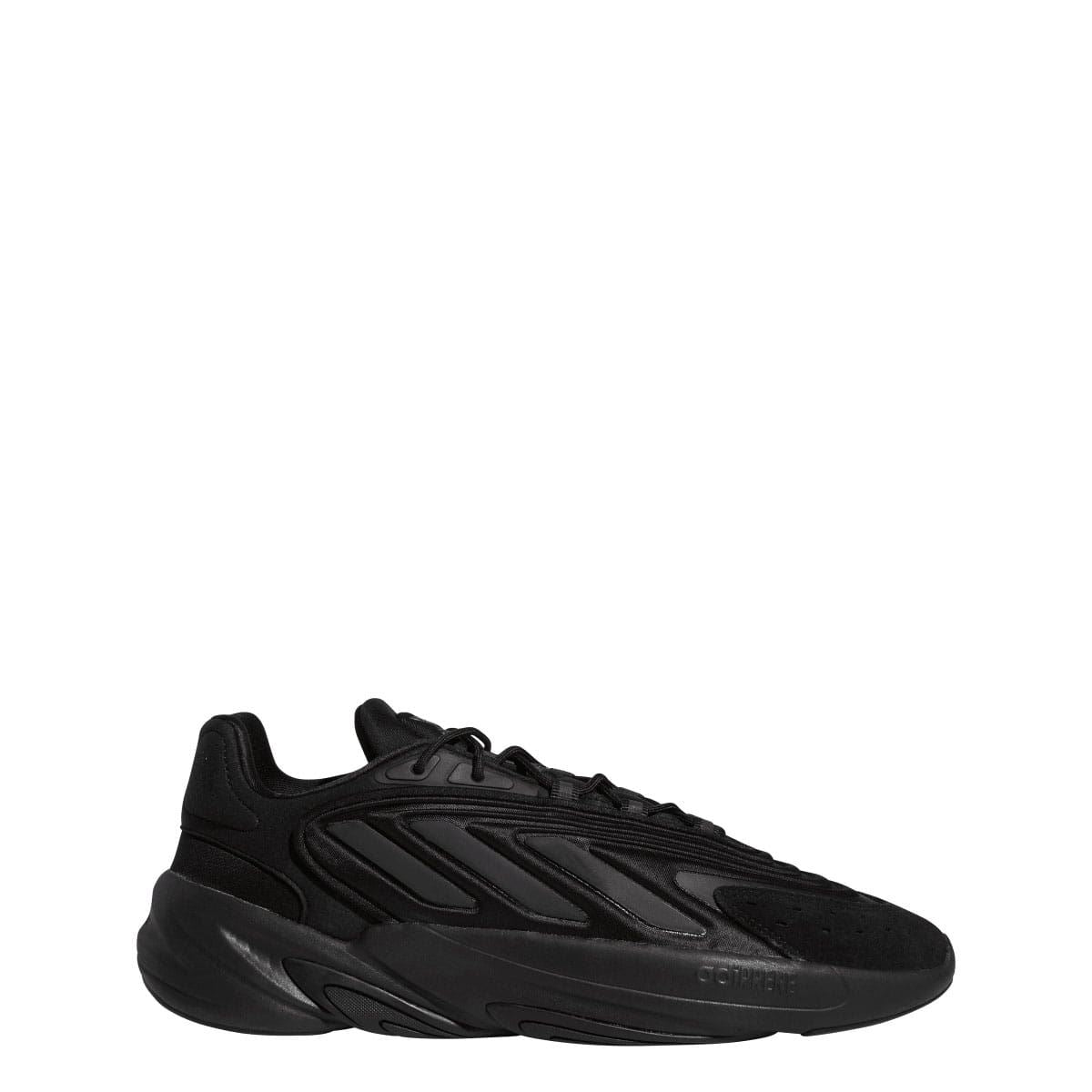 Black low-top trainers with lace-up, chunky midsole and side panels