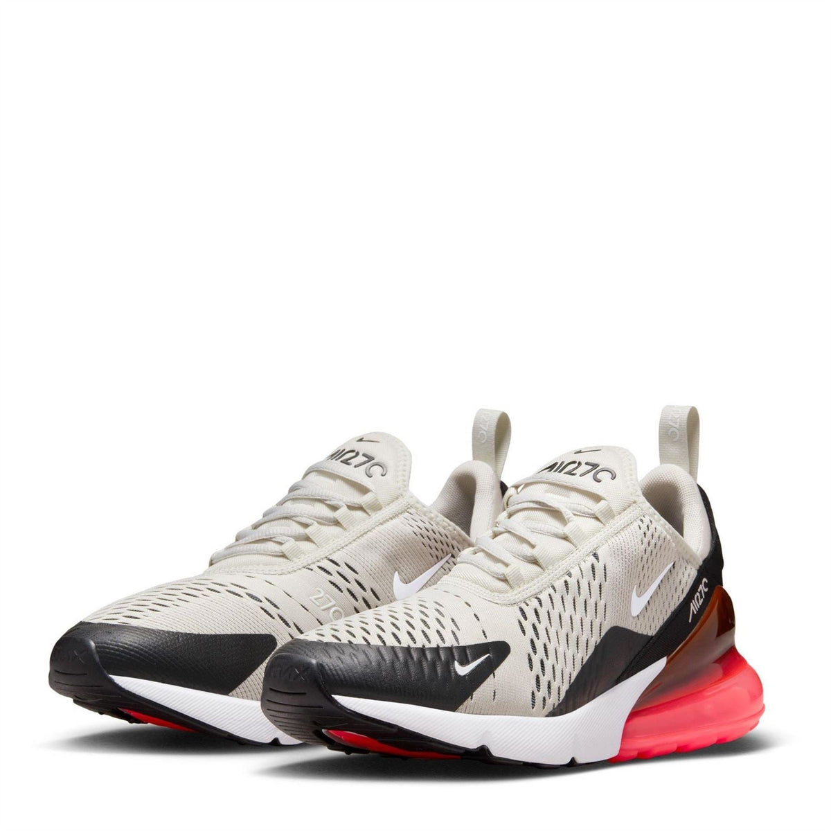 Pair of Air Max 270 sneakers in off-white with black swooshes and red air soles