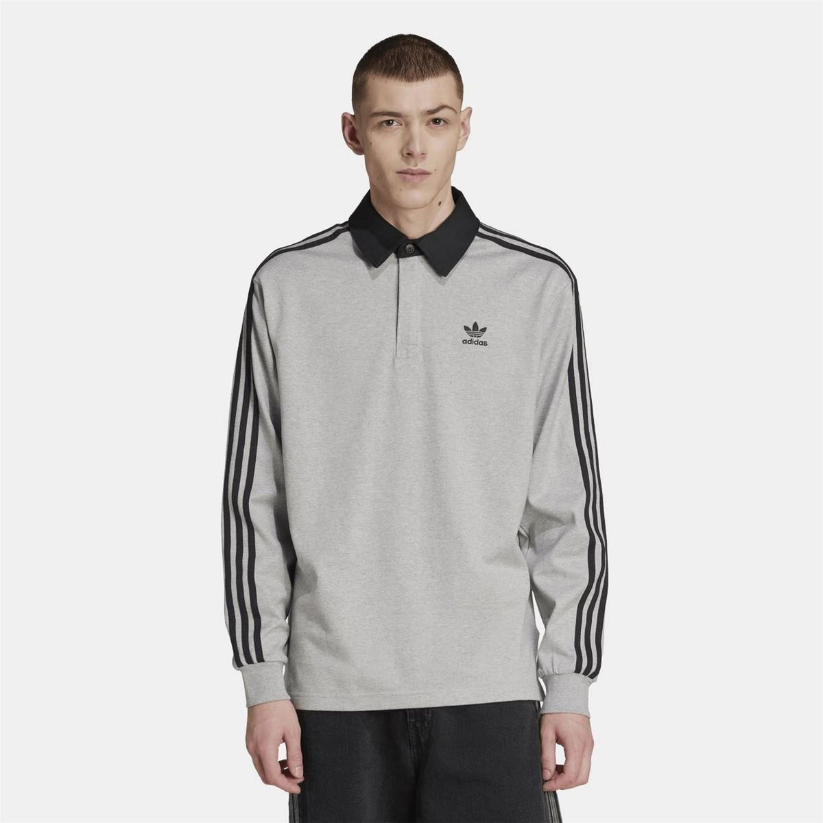 Grey rugby polo shirt with black collar, adidas chest logo, three-stripe sleeve panels.