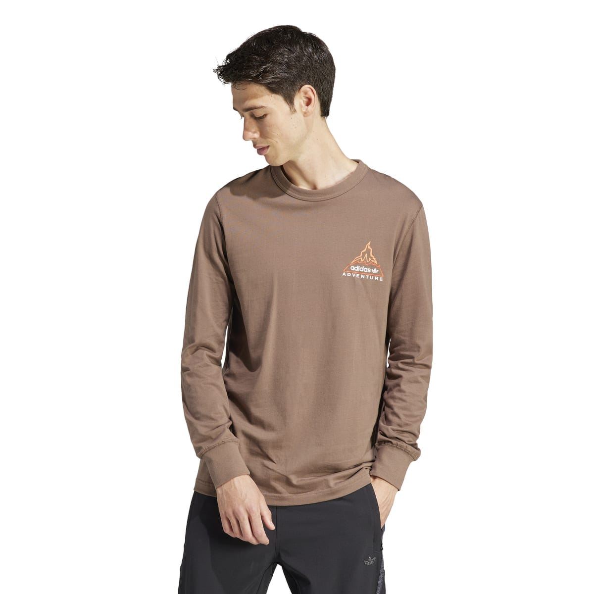 adidas Originals brown long-sleeve T-shirt on model, crew neck, chest adventure graphic