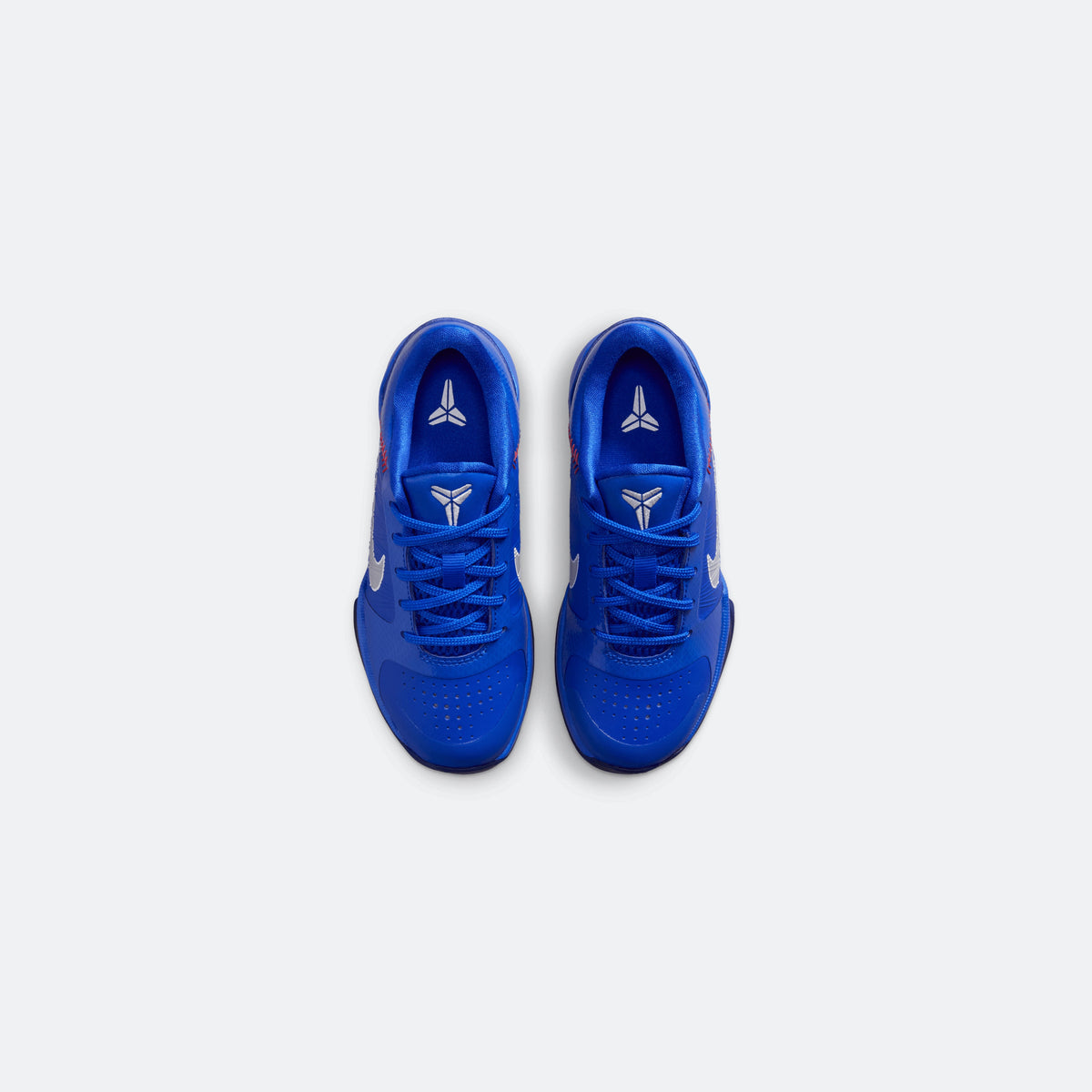Blue Nike Kobe V low-top kids basketball shoes, top view with lace eyelets