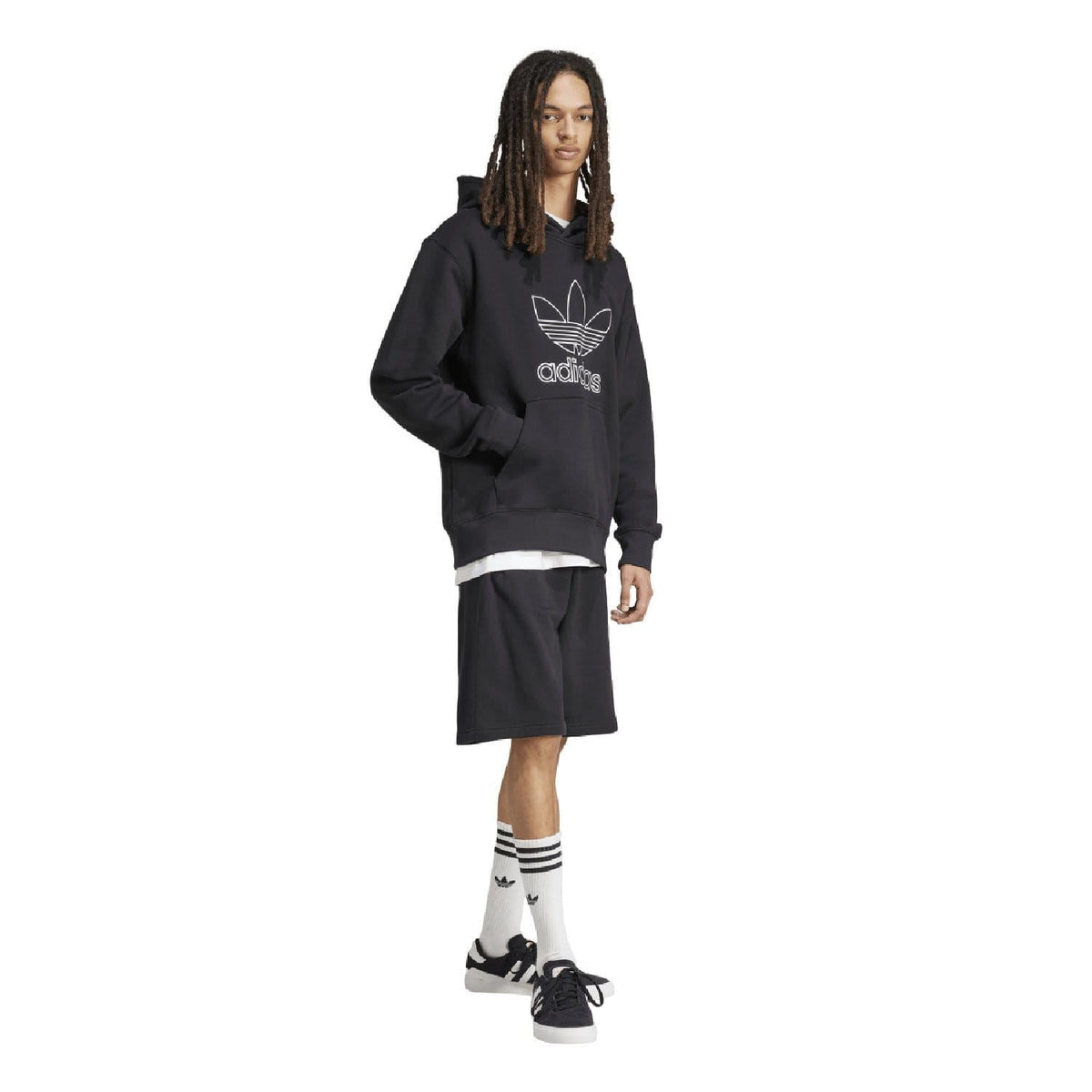 Black adidas trefoil outline hoodie worn with black shorts and striped socks