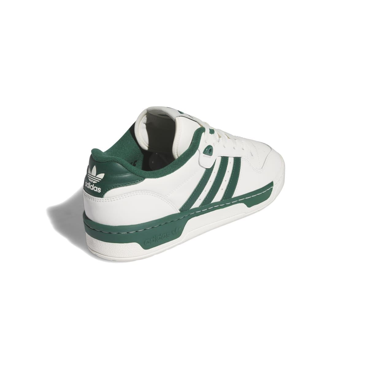Back angle of adidas Rivalry Low trainers: white upper with green heel collar and stripe