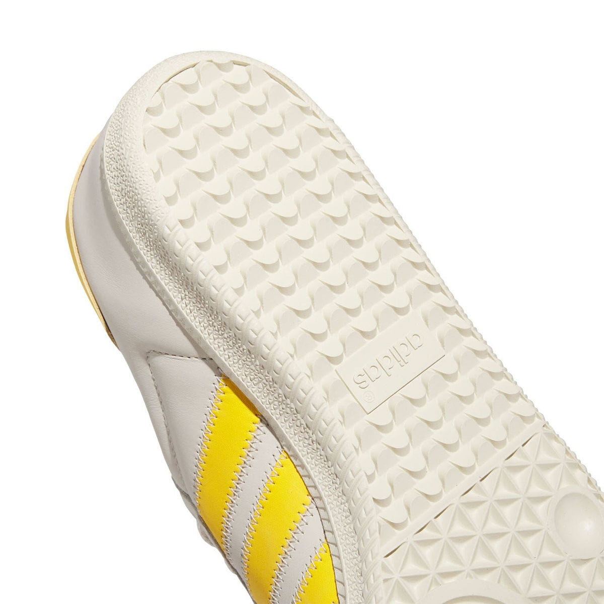 adidas Samba trainers treaded outsole with embossed pattern and yellow stripe detail