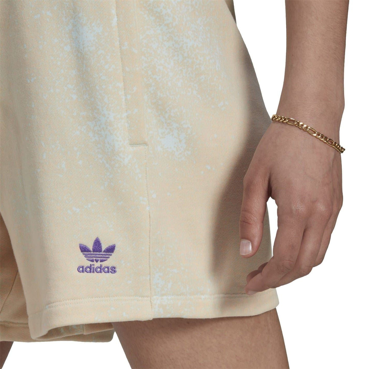 Cream sweat shorts with adidas Originals trefoil logo on left leg, stitched seams