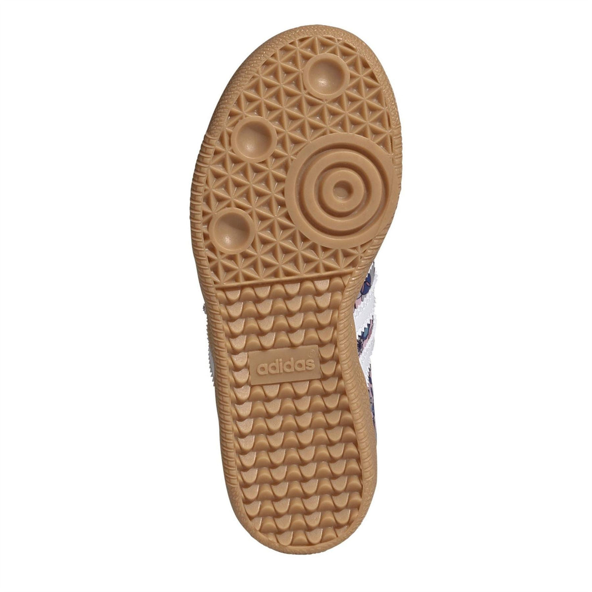 Gum rubber outsole for low-top sneakers with textured traction pattern.