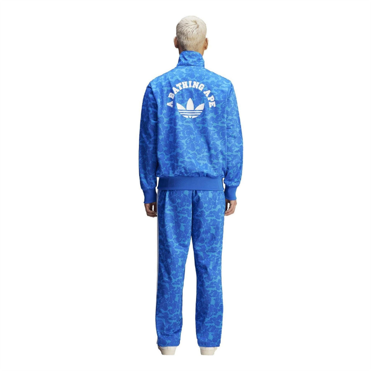 Blue patterned track top back with large trefoil-style logo and full-zip high collar