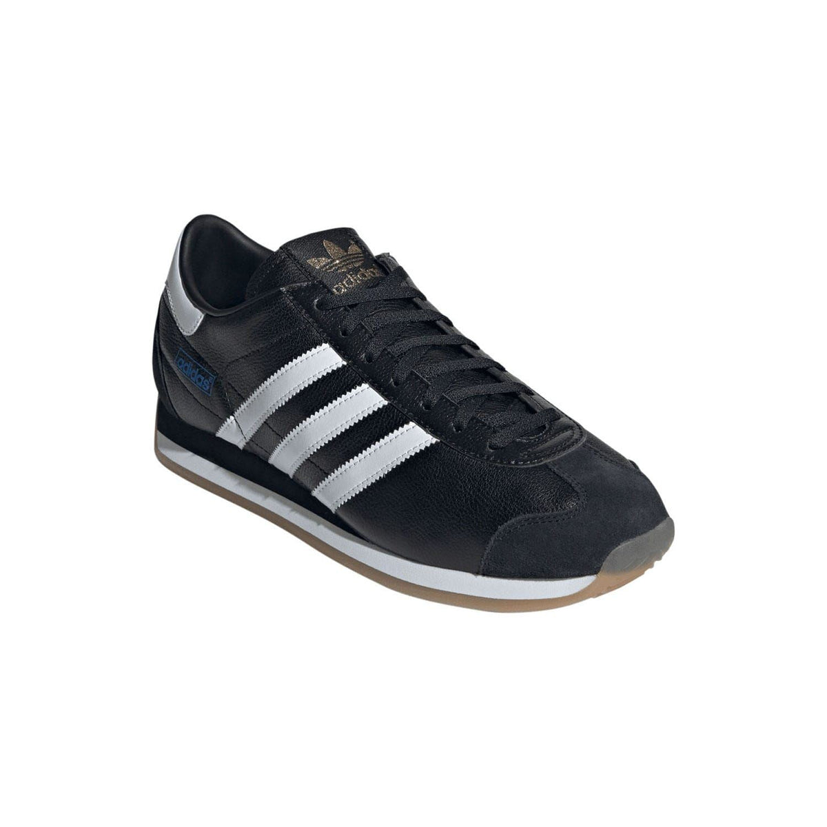 Black adidas Country Japan trainers with white stripes, lace-up front, and gum sole