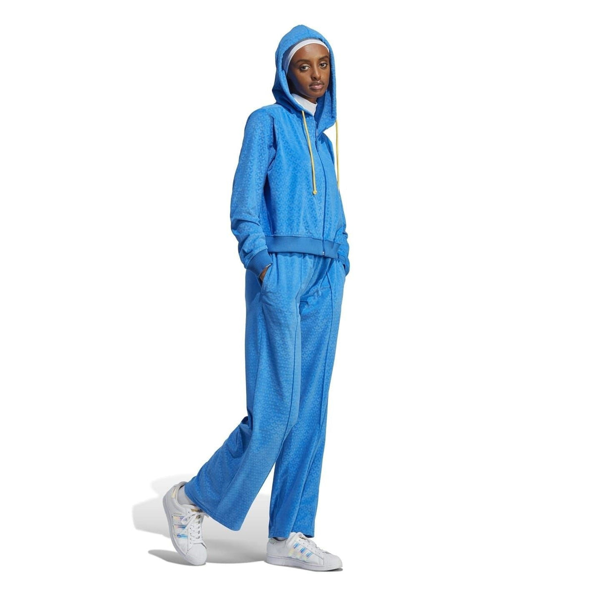 adidas Originals Adicolour 70s Velour Zip Hoodie in vibrant colors, featuring a full zip front and classic sweatshirt fit.