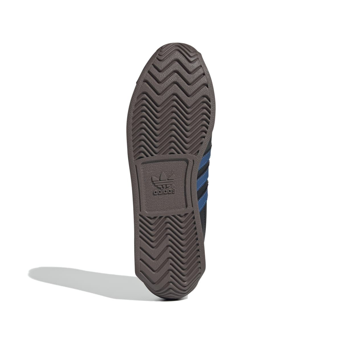 Trainer outsole with zigzag tread and adidas logo, dark brown rubber bottom