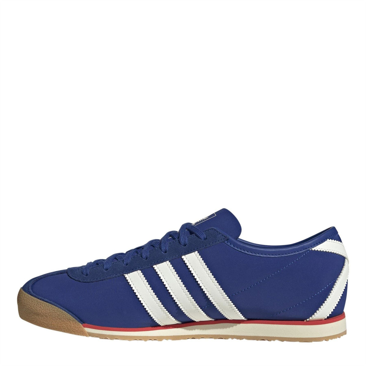 Men's royal blue low-top trainers with white stripes, lace-up style, and gum sole
