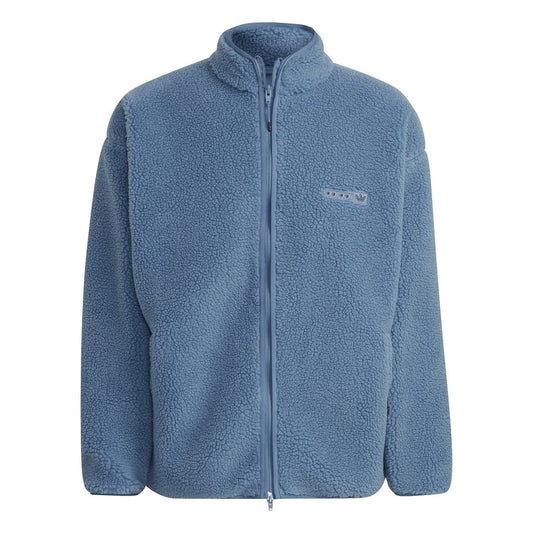 adidas Originals Sherpa Jacket sweatshirt with plush lining, cozy fit, and classic design, shown on a model.