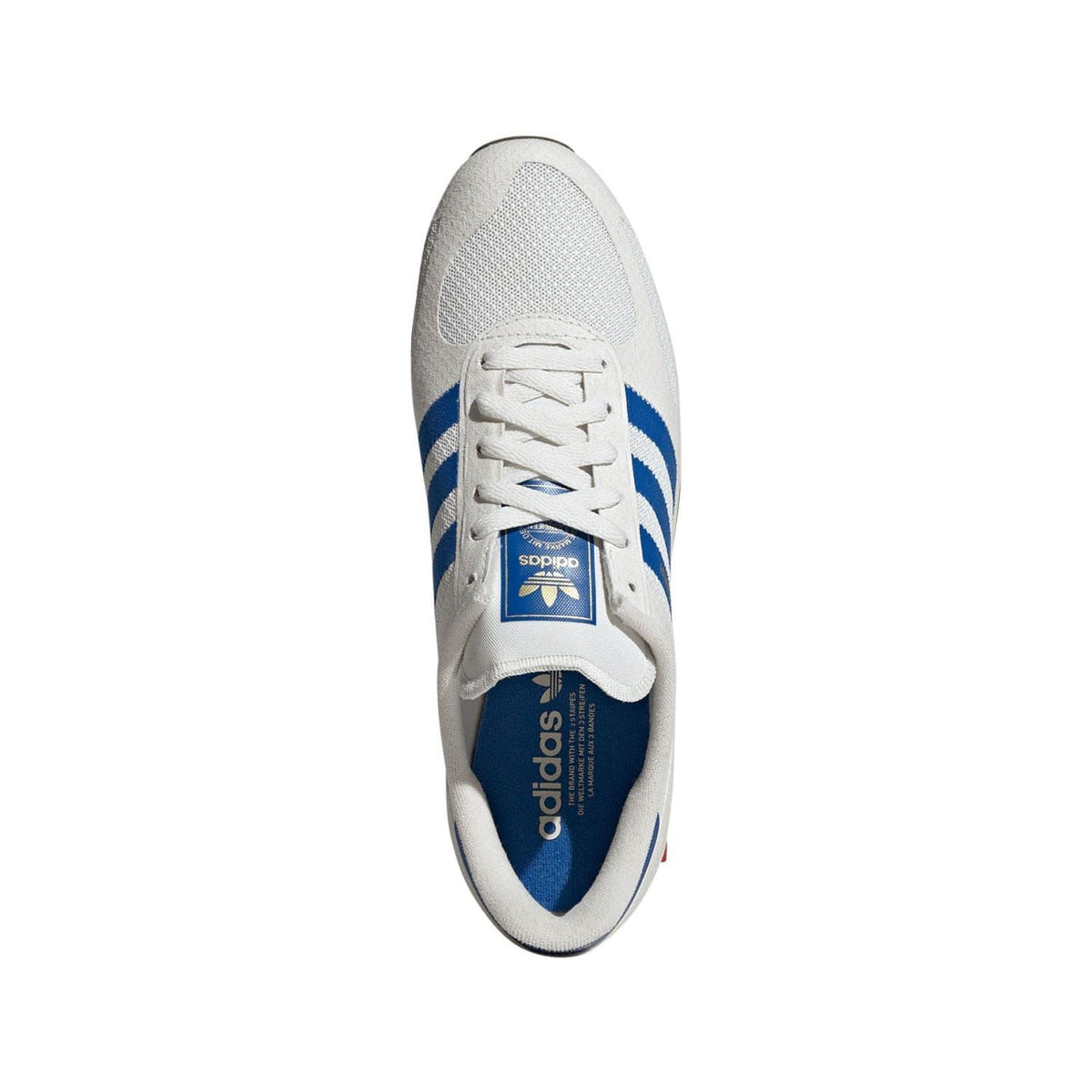 White adidas LA Trainer sneaker with blue tongue badge and lace-up front