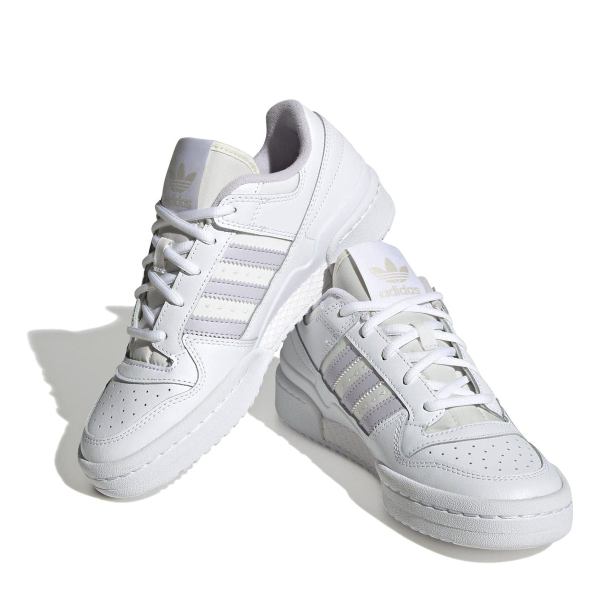 Pair of white low-top sneakers showing heel tab and side stripes detail