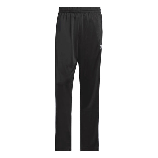Black track pants with elastic waistband and small white adidas logo on thigh