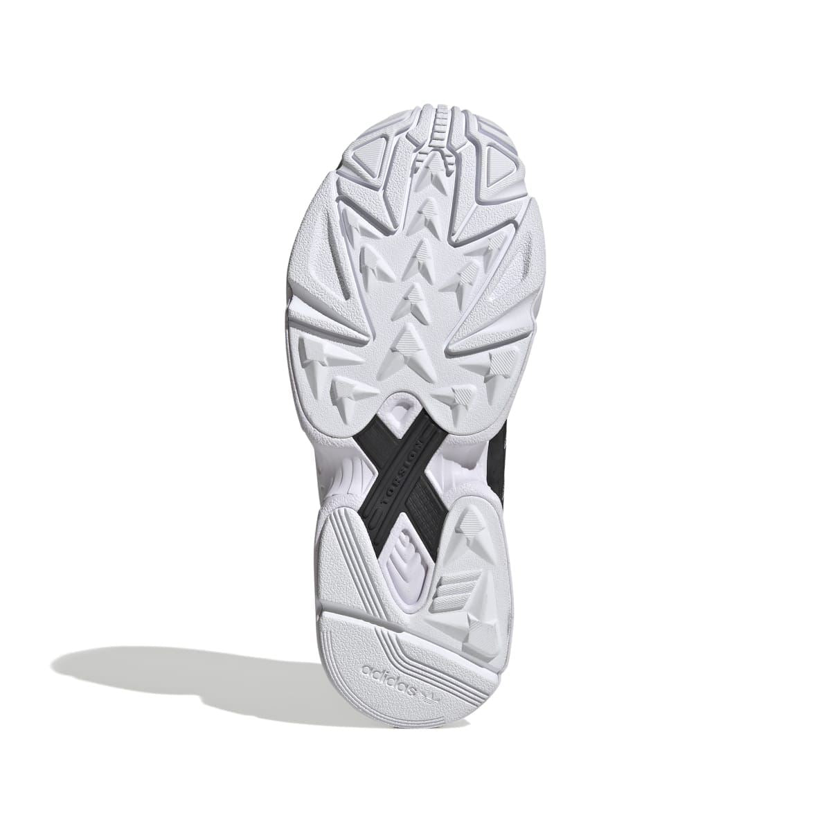 White outsole tread with geometric traction pattern