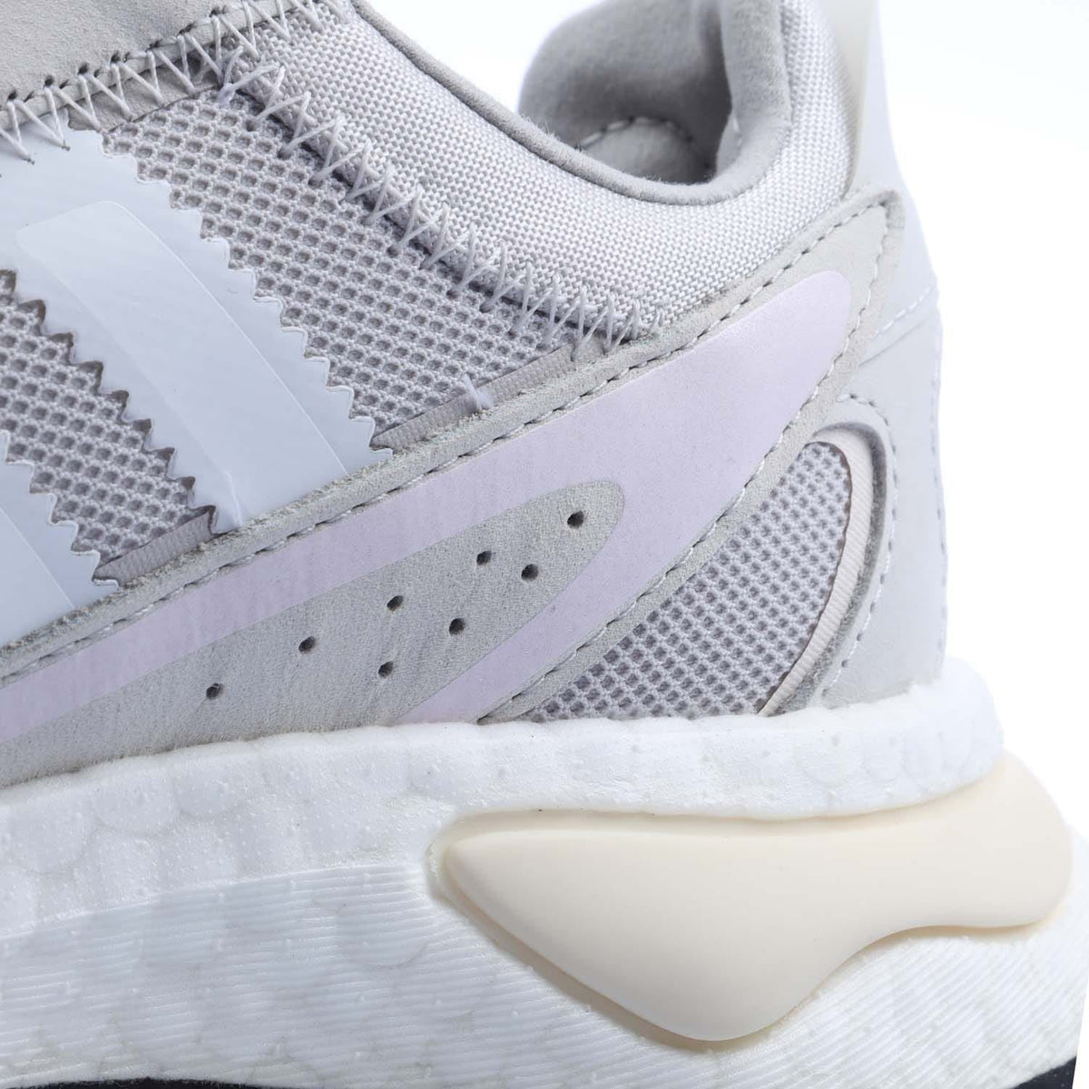 Grey adidas Originals womens trainers close-up of side stripes and sculpted midsole