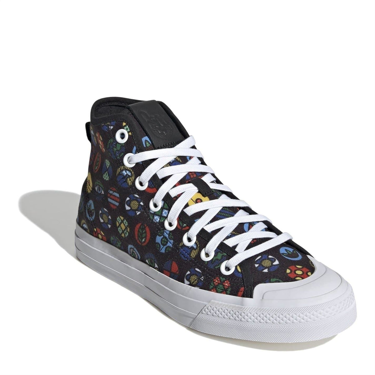 Angle view of black high-top sneakers with multicolor graphic upper and white midsole.