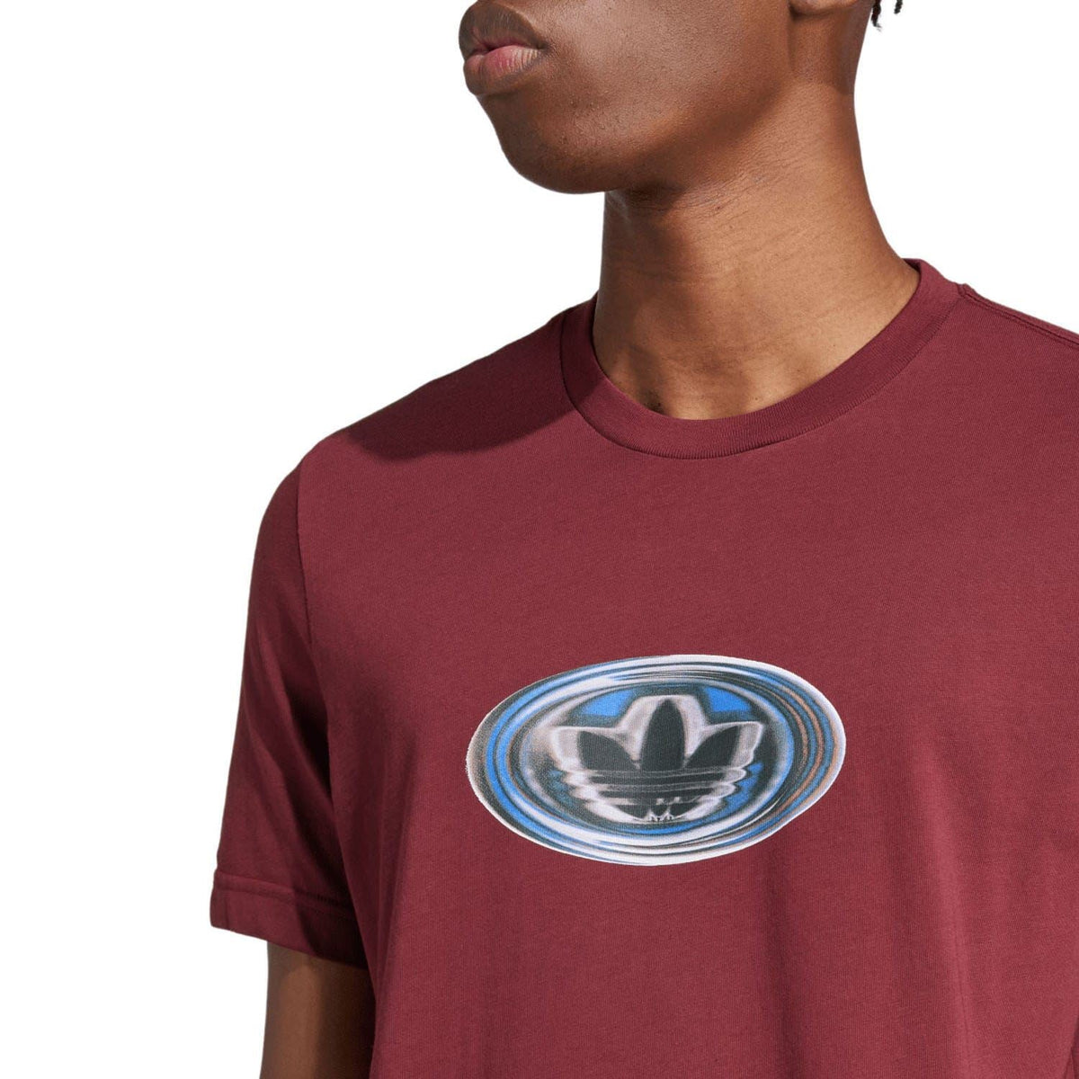 Maroon crew-neck T-shirt with close-up circular logo on chest