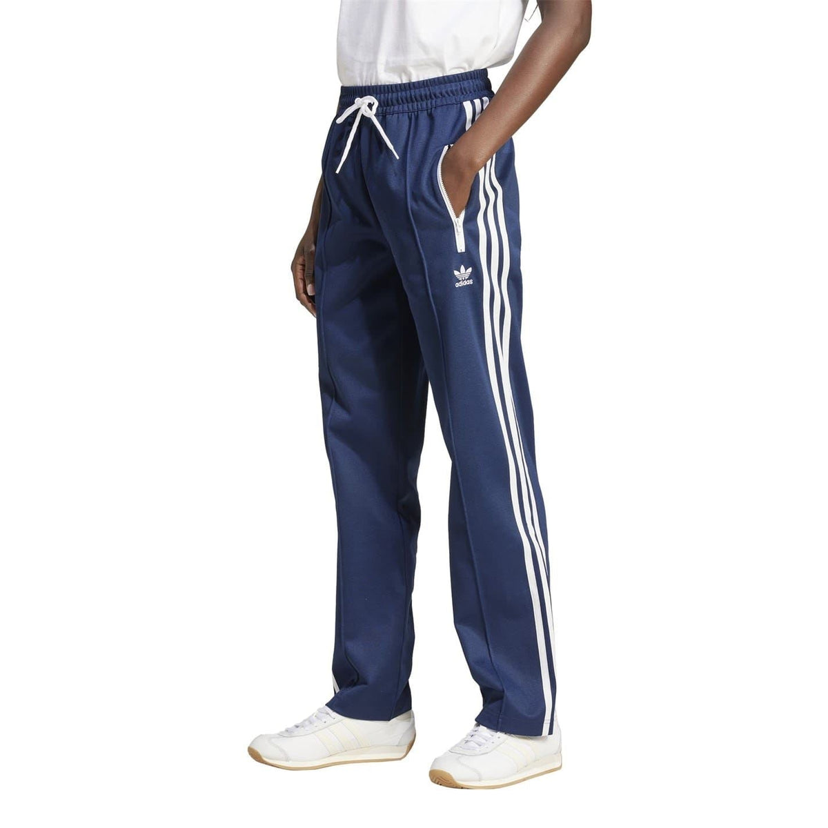 adidas Originals track pants with three white side stripes, elastic open hem, navy