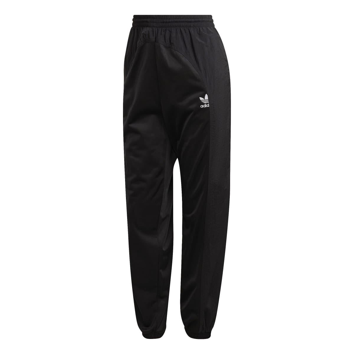 Black track pants with tapered legs, elastic cuffs, adidas trefoil logo on thigh
