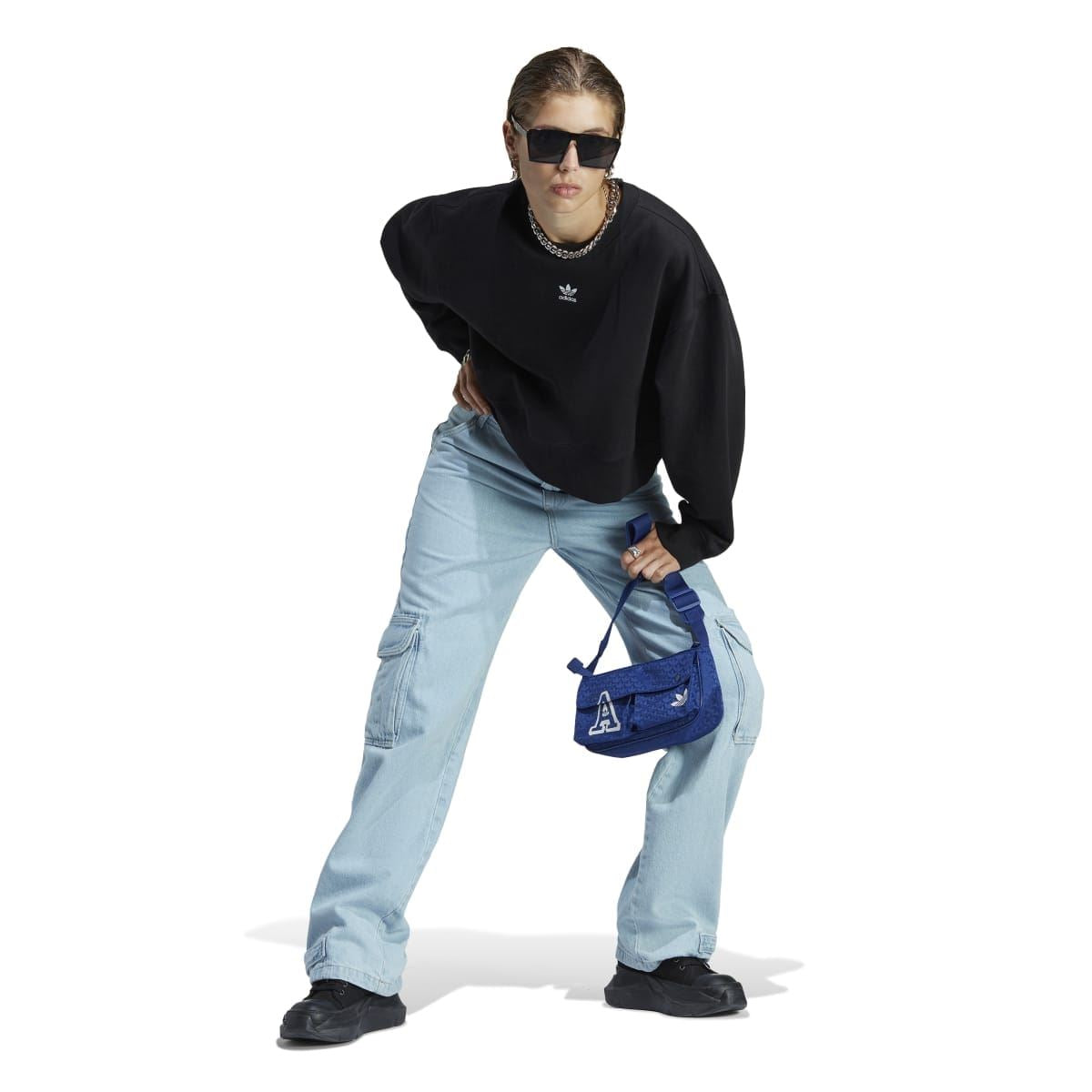 Black crewneck sweatshirt with adidas Trefoil logo; ribbed cuffs and hem