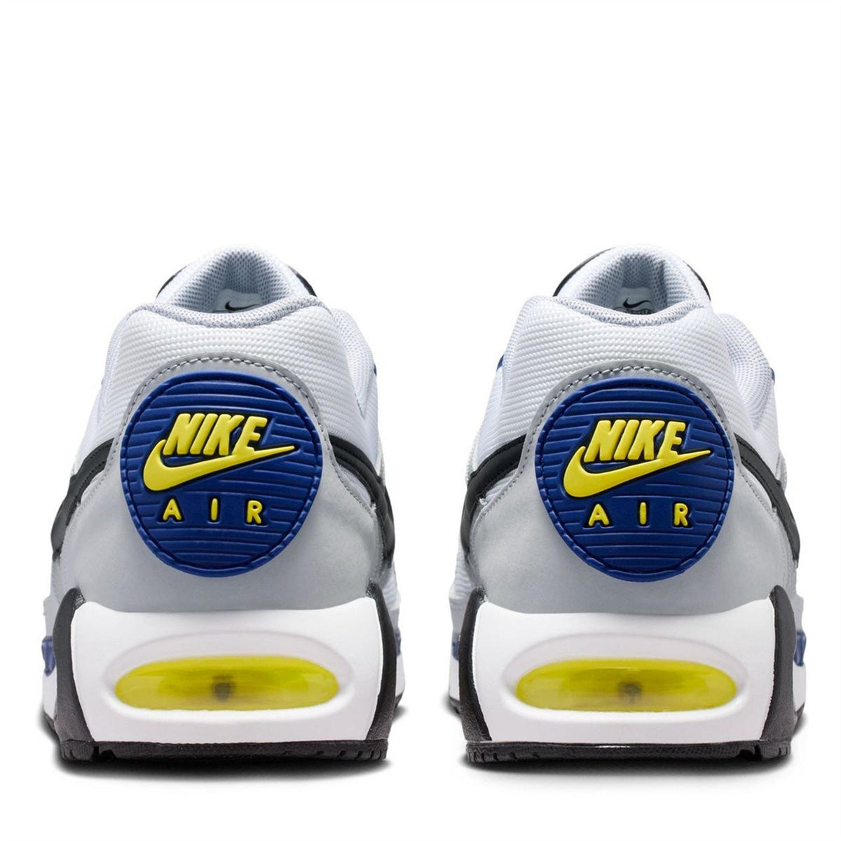 Air Max Ivo trainers heel view in white/gray with blue NIKE AIR badge and neon sole