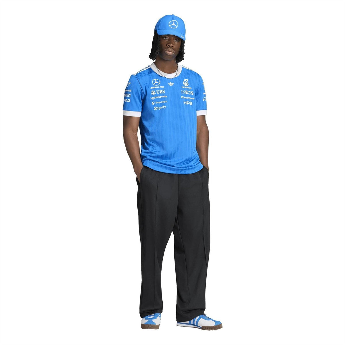 adidas Originals Mercedes Petronas graphic jersey T-shirt, blue with white trim, worn with cap