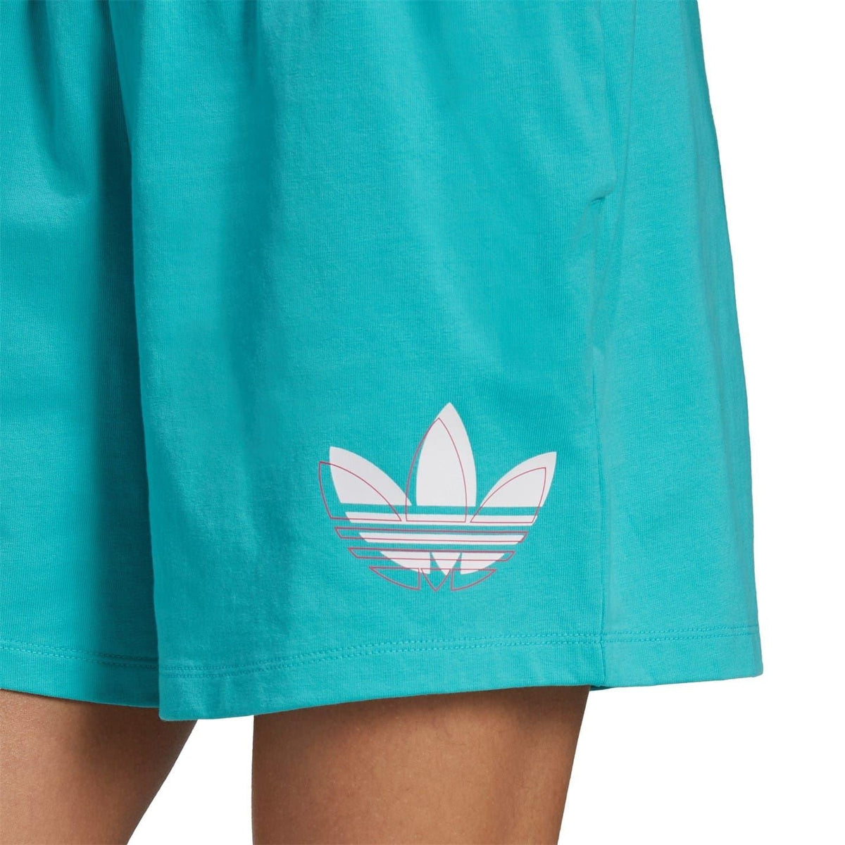 Turquoise adidas Originals shorts close-up of trefoil logo graphic on lower hem