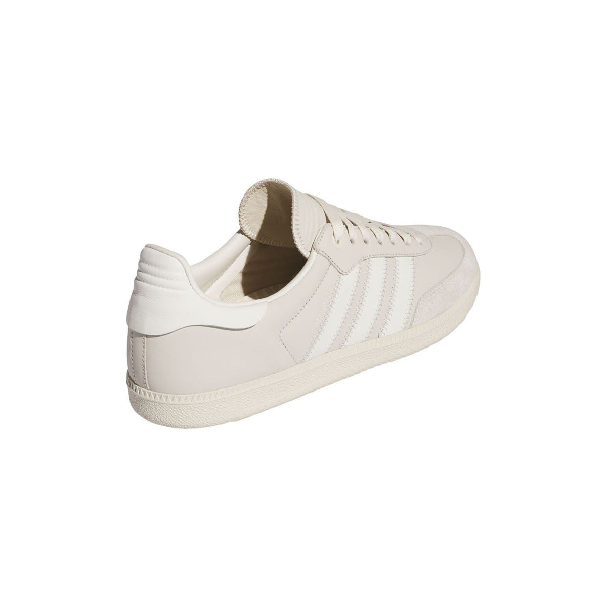 White low-top trainers with lace-up front, rear panel, and cushioned collar