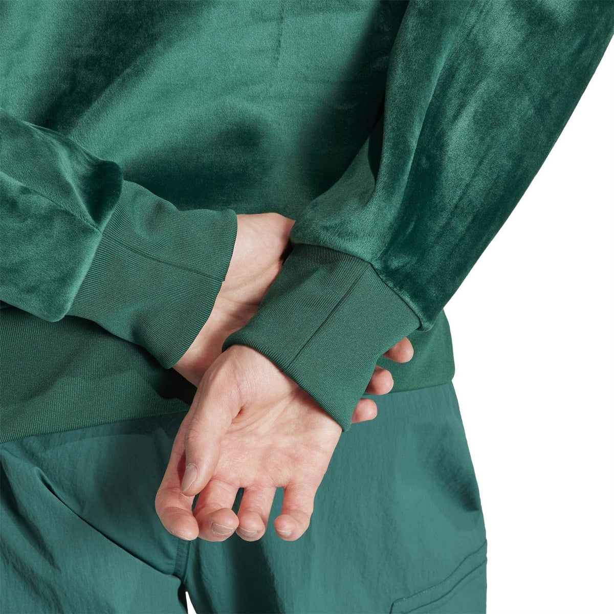 Green ribbed cuff and hem detail on long sleeve sweater, relaxed fit