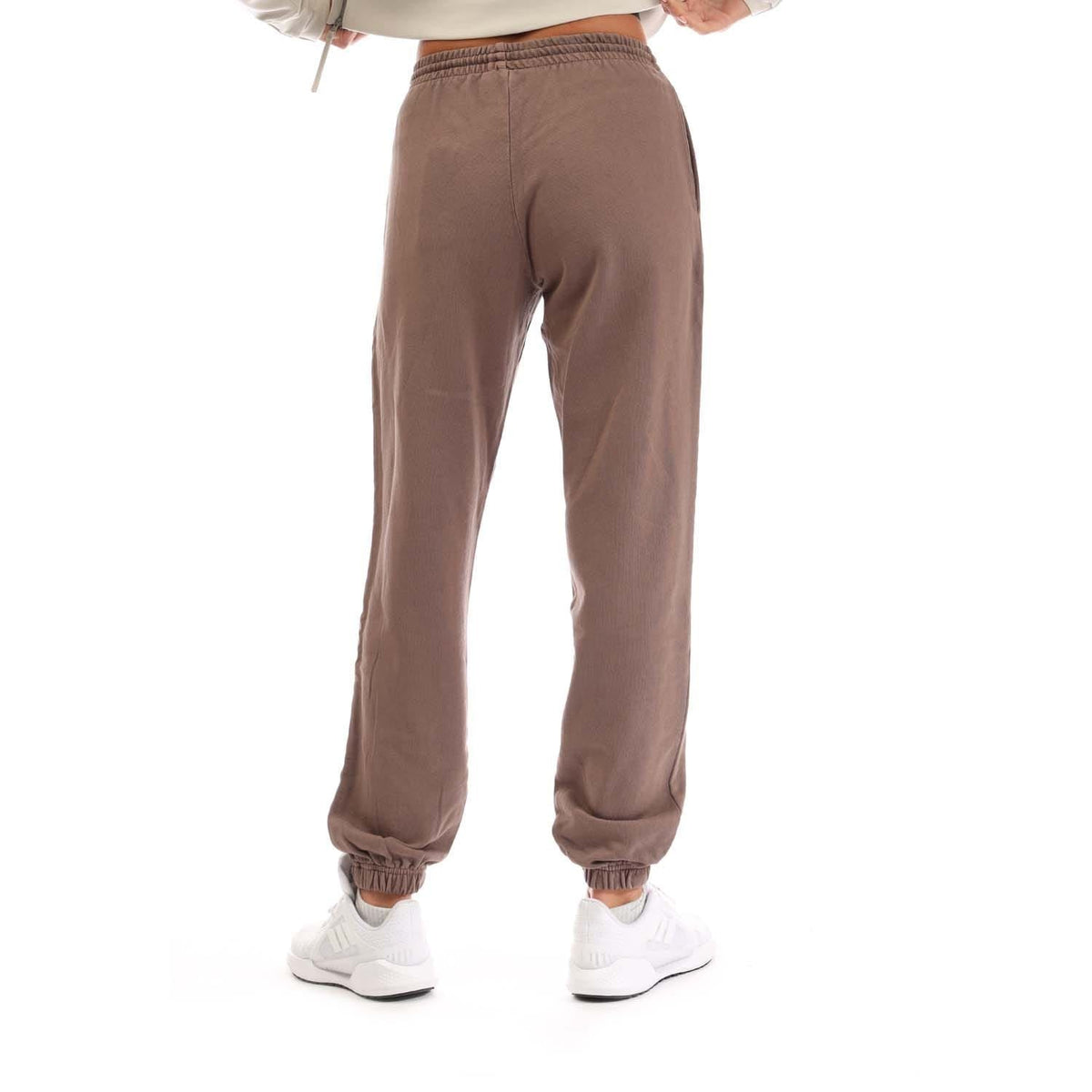 Brown joggers, tapered fit, elastic cuffs and small logo on thigh