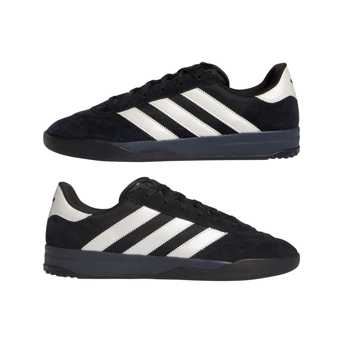 Pair of black adidas trainers with white three stripes and black laces