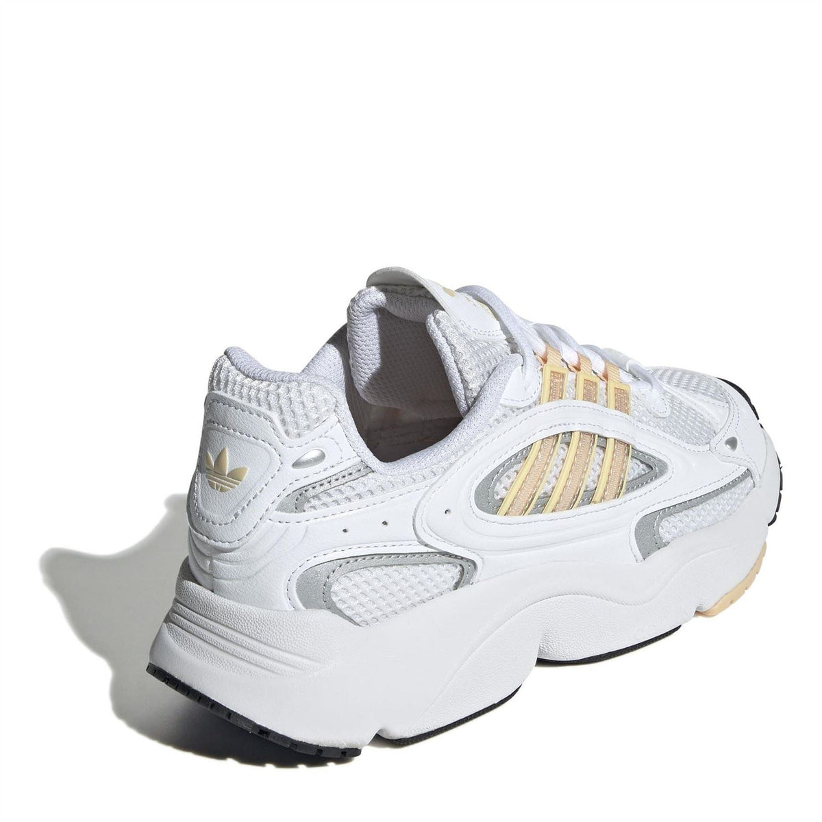 adidas Originals low-top sneakers, heel side view, white upper with gold branding accents