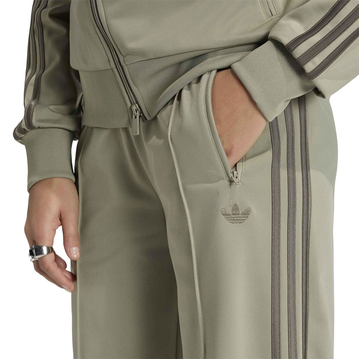 adidas Originals khaki green joggers with side zip pocket and embroidered emblem