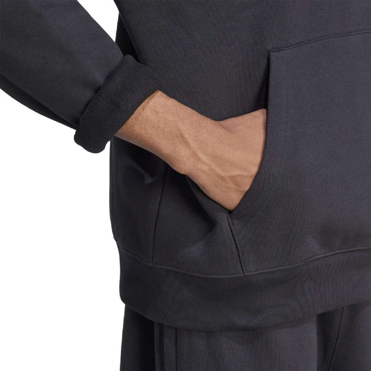 Black hoodie with kangaroo pocket opening and ribbed hem detail