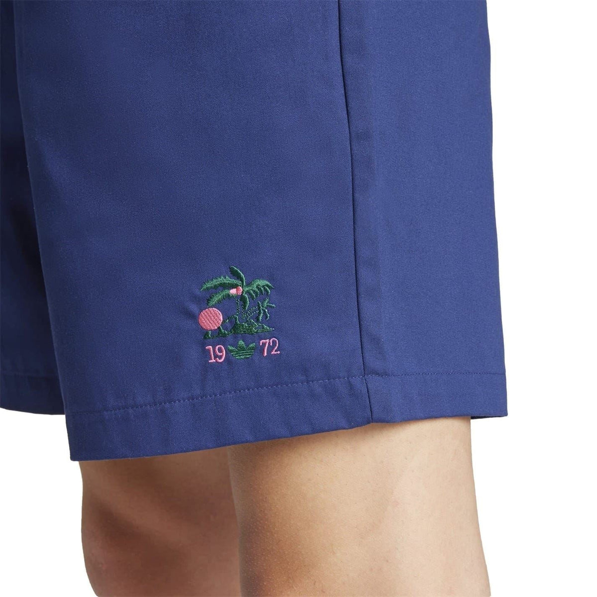 adidas Originals Leisure League Groundskeeper Shorts in black, casual athletic shorts with side pockets and branded logo detail
